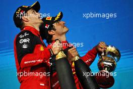 (L to R): Race winner Charles Leclerc (MON) Ferrari celebrates with second placed team mate Carlos Sainz Jr (ESP) Ferrari on the podium. 20.03.2022. Formula 1 World Championship, Rd 1, Bahrain Grand Prix, Sakhir, Bahrain, Race Day.