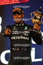 Lewis Hamilton (GBR) Mercedes AMG F1 celebrates his third position on the podium. 20.03.2022. Formula 1 World Championship, Rd 1, Bahrain Grand Prix, Sakhir, Bahrain, Race Day.