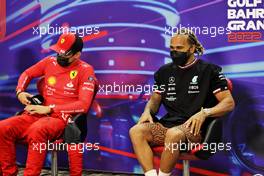 (L to R): Charles Leclerc (MON) Ferrari and Lewis Hamilton (GBR) Mercedes AMG F1 in the post race FIA Press Conference. 20.03.2022. Formula 1 World Championship, Rd 1, Bahrain Grand Prix, Sakhir, Bahrain, Race Day.