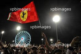 Ferrari fans celebrate at the podium. 20.03.2022. Formula 1 World Championship, Rd 1, Bahrain Grand Prix, Sakhir, Bahrain, Race Day.