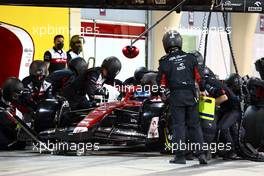 Valtteri Bottas (FIN) Alfa Romeo F1 Team C42 pit stop. 20.03.2022. Formula 1 World Championship, Rd 1, Bahrain Grand Prix, Sakhir, Bahrain, Race Day.
