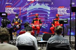 (L to R): Max Verstappen (NLD) Red Bull Racing; Charles Leclerc (MON) Ferrari; and Carlos Sainz Jr (ESP) Ferrari, in the post qualifying FIA Press Conference. 19.03.2022. Formula 1 World Championship, Rd 1, Bahrain Grand Prix, Sakhir, Bahrain, Qualifying Day.