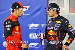 (L to R): Charles Leclerc (MON) Ferrari in qualifying parc ferme with Max Verstappen (NLD) Red Bull Racing. 19.03.2022. Formula 1 World Championship, Rd 1, Bahrain Grand Prix, Sakhir, Bahrain, Qualifying Day.
