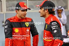 (L to R): Pole sitter Charles Leclerc (MON) Ferrari with team mate Carlos Sainz Jr (ESP) Ferrari in qualifying parc ferme. 19.03.2022. Formula 1 World Championship, Rd 1, Bahrain Grand Prix, Sakhir, Bahrain, Qualifying Day.