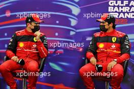(L to R): Charles Leclerc (MON) Ferrari and team mate Carlos Sainz Jr (ESP) Ferrari in the post qualifying FIA Press Conference. 19.03.2022. Formula 1 World Championship, Rd 1, Bahrain Grand Prix, Sakhir, Bahrain, Qualifying Day.