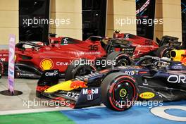 Max Verstappen (NLD) Red Bull Racing RB18 and pole sitter Charles Leclerc (MON) Ferrari F1-75 in qualifying parc ferme. 19.03.2022. Formula 1 World Championship, Rd 1, Bahrain Grand Prix, Sakhir, Bahrain, Qualifying Day.