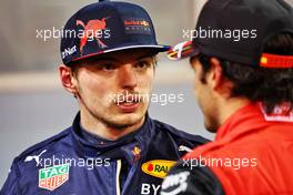 (L to R): Max Verstappen (NLD) Red Bull Racing with Carlos Sainz Jr (ESP) Ferrari in qualifying parc ferme. 19.03.2022. Formula 1 World Championship, Rd 1, Bahrain Grand Prix, Sakhir, Bahrain, Qualifying Day.