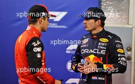 (L to R): Charles Leclerc (MON) Ferrari in qualifying parc ferme with Max Verstappen (NLD) Red Bull Racing. 19.03.2022. Formula 1 World Championship, Rd 1, Bahrain Grand Prix, Sakhir, Bahrain, Qualifying Day.