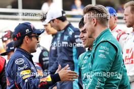 (L to R): Sergio Perez (MEX) Red Bull Racing; Lance Stroll (CDN) Aston Martin F1 Team; and Nico Hulkenberg (GER) Aston Martin F1 Team Reserve Driver at the start of season driver's photograph. 20.03.2022. Formula 1 World Championship, Rd 1, Bahrain Grand Prix, Sakhir, Bahrain, Race Day.