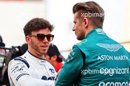 (L to R): Pierre Gasly (FRA) AlphaTauri and Nico Hulkenberg (GER) Aston Martin F1 Team Reserve Driver on the drivers parade. 20.03.2022. Formula 1 World Championship, Rd 1, Bahrain Grand Prix, Sakhir, Bahrain, Race Day.