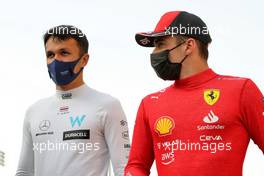(L to R): Alexander Albon (THA) Williams Racing and Charles Leclerc (MON) Ferrari. 20.03.2022. Formula 1 World Championship, Rd 1, Bahrain Grand Prix, Sakhir, Bahrain, Race Day.