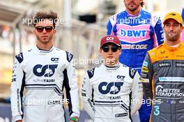 (L to R): Pierre Gasly (FRA) AlphaTauri and Yuki Tsunoda (JPN) AlphaTauri at the start of season driver's photograph. 20.03.2022. Formula 1 World Championship, Rd 1, Bahrain Grand Prix, Sakhir, Bahrain, Race Day.