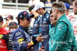(L to R): Sergio Perez (MEX) Red Bull Racing; Lance Stroll (CDN) Aston Martin F1 Team; and Nico Hulkenberg (GER) Aston Martin F1 Team Reserve Driver at the start of season driver's photograph. 20.03.2022. Formula 1 World Championship, Rd 1, Bahrain Grand Prix, Sakhir, Bahrain, Race Day.