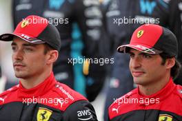 Carlos Sainz Jr (ESP) Ferrari and Charles Leclerc (MON) Ferrari at the start of season driver's photograph. 20.03.2022. Formula 1 World Championship, Rd 1, Bahrain Grand Prix, Sakhir, Bahrain, Race Day.