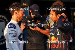 (L to R): Pierre Gasly (FRA) AlphaTauri with Sergio Perez (MEX) Red Bull Racing. 17.03.2022. Formula 1 World Championship, Rd 1, Bahrain Grand Prix, Sakhir, Bahrain, Preparation Day.