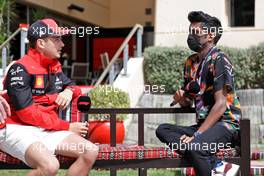 (L to R): Charles Leclerc (MON) Ferrari with Lawrence Barretto (GBR) Formula 1 Senior Writer Editor. 17.03.2022. Formula 1 World Championship, Rd 1, Bahrain Grand Prix, Sakhir, Bahrain, Preparation Day.