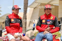(L to R): Charles Leclerc (MON) Ferrari and team mate Carlos Sainz Jr (ESP) Ferrari. 17.03.2022. Formula 1 World Championship, Rd 1, Bahrain Grand Prix, Sakhir, Bahrain, Preparation Day.
