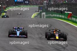Esteban Ocon (FRA), Alpine F1 Team and Max Verstappen (NLD), Red Bull Racing  11.11.2022. Formula 1 World Championship, Rd 21, Brazilian Grand Prix, Sao Paulo, Brazil, Qualifying Day.