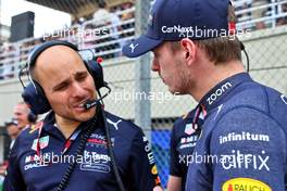 Max Verstappen (NLD) Red Bull Racing with Gianpiero Lambiase (ITA) Red Bull Racing Engineer on the grid. 13.11.2022. Formula 1 World Championship, Rd 21, Brazilian Grand Prix, Sao Paulo, Brazil, Race Day.