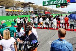 Drivers as the grid observes the national anthem. 13.11.2022. Formula 1 World Championship, Rd 21, Brazilian Grand Prix, Sao Paulo, Brazil, Race Day.