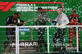 1st place George Russell (GBR) Mercedes AMG F1 W13 with 2nd place Lewis Hamilton (GBR) Mercedes AMG F1 W13 and 3rd place Carlos Sainz Jr (ESP) Ferrari. 13.11.2022. Formula 1 World Championship, Rd 21, Brazilian Grand Prix, Sao Paulo, Brazil, Race Day.
