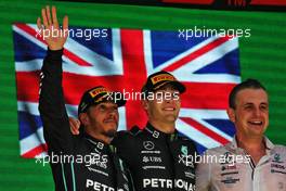 The podium (L to R): Lewis Hamilton (GBR) Mercedes AMG F1, second; George Russell (GBR) Mercedes AMG F1, race winner; Riccardo Musconi (ITA) Mercedes AMG F1 Performance Engineer. 13.11.2022. Formula 1 World Championship, Rd 21, Brazilian Grand Prix, Sao Paulo, Brazil, Race Day.