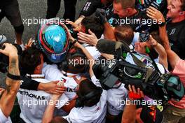 Race winner George Russell (GBR) Mercedes AMG F1 with the team in parc ferme. 13.11.2022. Formula 1 World Championship, Rd 21, Brazilian Grand Prix, Sao Paulo, Brazil, Race Day.