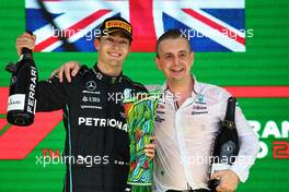(L to R): race winner George Russell (GBR) Mercedes AMG F1 celebrates on the podium with Riccardo Musconi (ITA) Mercedes AMG F1 Performance Engineer. 13.11.2022. Formula 1 World Championship, Rd 21, Brazilian Grand Prix, Sao Paulo, Brazil, Race Day.
