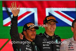 (L to R): second placed Lewis Hamilton (GBR) Mercedes AMG F1 and race winner George Russell (GBR) Mercedes AMG F1 on the podium. 13.11.2022. Formula 1 World Championship, Rd 21, Brazilian Grand Prix, Sao Paulo, Brazil, Race Day.