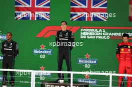 Lewis Hamilton (GBR), Mercedes AMG F1  Lewis Hamilton (GBR), Mercedes AMG F1  and Carlos Sainz Jr (ESP), Scuderia Ferrari  13.11.2022. Formula 1 World Championship, Rd 21, Brazilian Grand Prix, Sao Paulo, Brazil, Race Day.