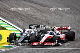 Pierre Gasly (FRA) AlphaTauri AT03 and Mick Schumacher (GER) Haas VF-22 battle for position. 13.11.2022. Formula 1 World Championship, Rd 21, Brazilian Grand Prix, Sao Paulo, Brazil, Race Day.