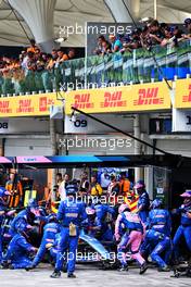 Fernando Alonso (ESP) Alpine F1 Team A522 makes a pit stop. 13.11.2022. Formula 1 World Championship, Rd 21, Brazilian Grand Prix, Sao Paulo, Brazil, Race Day.