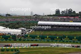 Sergio Perez (MEX) Red Bull Racing RB18 leads Carlos Sainz Jr (ESP) Ferrari F1-75. 13.11.2022. Formula 1 World Championship, Rd 21, Brazilian Grand Prix, Sao Paulo, Brazil, Race Day.