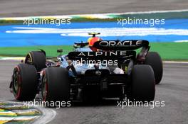 Fernando Alonso (ESP), Alpine F1 Team and Sergio Perez (MEX), Red Bull Racing  13.11.2022. Formula 1 World Championship, Rd 21, Brazilian Grand Prix, Sao Paulo, Brazil, Race Day.