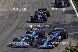 (L to R): Esteban Ocon (FRA) Alpine F1 Team A522 and Fernando Alonso (ESP) Alpine F1 Team A522 battle for position. 13.11.2022. Formula 1 World Championship, Rd 21, Brazilian Grand Prix, Sao Paulo, Brazil, Race Day.