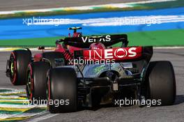 Carlos Sainz Jr (ESP), Scuderia Ferrari and Lewis Hamilton (GBR), Mercedes AMG F1   12.11.2022. Formula 1 World Championship, Rd 21, Brazilian Grand Prix, Sao Paulo, Brazil, Sprint Day.