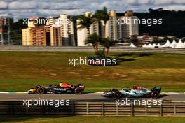 Max Verstappen (NLD) Red Bull Racing RB18 leads Lewis Hamilton (GBR) Mercedes AMG F1 W13. 12.11.2022. Formula 1 World Championship, Rd 21, Brazilian Grand Prix, Sao Paulo, Brazil, Sprint Day.