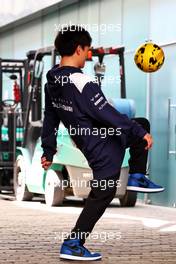 Yuki Tsunoda (JPN) AlphaTauri plays football in the paddock. 10.11.2022. Formula 1 World Championship, Rd 21, Brazilian Grand Prix, Sao Paulo, Brazil, Preparation Day.