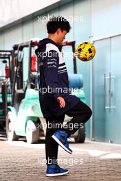 Yuki Tsunoda (JPN) AlphaTauri plays football in the paddock. 10.11.2022. Formula 1 World Championship, Rd 21, Brazilian Grand Prix, Sao Paulo, Brazil, Preparation Day.