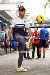 Pierre Gasly (FRA) AlphaTauri plays football in the paddock. 10.11.2022. Formula 1 World Championship, Rd 21, Brazilian Grand Prix, Sao Paulo, Brazil, Preparation Day.