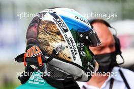 Sebastian Vettel (GER) Aston Martin F1 Team with helmet highlighting Canada's extraction of oil from the Athabasca tar sands in northeastern Canada. 17.06.2022. Formula 1 World Championship, Rd 9, Canadian Grand Prix, Montreal, Canada, Practice Day.
