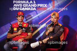 (L to R): Carlos Sainz Jr (ESP) Ferrari and Lando Norris (GBR) McLaren in the FIA Press Conference. 17.06.2022. Formula 1 World Championship, Rd 9, Canadian Grand Prix, Montreal, Canada, Practice Day.