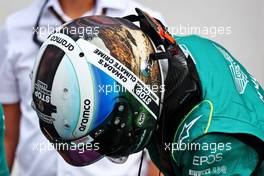 Sebastian Vettel (GER) Aston Martin F1 Team with helmet highlighting Canada's extraction of oil from the Athabasca tar sands in northeastern Canada. 17.06.2022. Formula 1 World Championship, Rd 9, Canadian Grand Prix, Montreal, Canada, Practice Day.