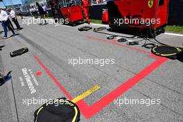 Grid position of Charles Leclerc (MON) Ferrari painted red in tribute to Gilles Villeneuve. 19.06.2022. Formula 1 World Championship, Rd 9, Canadian Grand Prix, Montreal, Canada, Race Day.