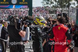 (L to R): Lewis Hamilton (GBR) Mercedes AMG F1 celebrates his second position with third placed Carlos Sainz Jr (ESP) Ferrari in parc ferme. 19.06.2022. Formula 1 World Championship, Rd 9, Canadian Grand Prix, Montreal, Canada, Race Day.