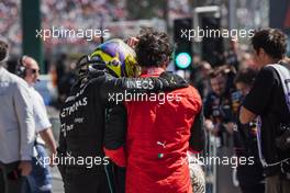 (L to R): Lewis Hamilton (GBR) Mercedes AMG F1 celebrates his second position with third placed Carlos Sainz Jr (ESP) Ferrari in parc ferme. 19.06.2022. Formula 1 World Championship, Rd 9, Canadian Grand Prix, Montreal, Canada, Race Day.