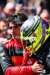 (L to R): Carlos Sainz Jr (ESP) Ferrari celebrates his second position with third placed Lewis Hamilton (GBR) Mercedes AMG F1 in parc ferme. 19.06.2022. Formula 1 World Championship, Rd 9, Canadian Grand Prix, Montreal, Canada, Race Day.