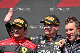 (L to R): Second placed Carlos Sainz Jr (ESP) Ferrari with race winner Max Verstappen (NLD) Red Bull Racing on the podium. 19.06.2022. Formula 1 World Championship, Rd 9, Canadian Grand Prix, Montreal, Canada, Race Day.