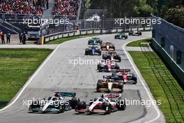 George Russell (GBR) Mercedes AMG F1 W13 and Mick Schumacher (GER) Haas VF-22 battle for position. 19.06.2022. Formula 1 World Championship, Rd 9, Canadian Grand Prix, Montreal, Canada, Race Day.