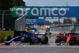 Esteban Ocon (FRA) Alpine F1 Team A522 and Charles Leclerc (MON) Ferrari F1-75. 19.06.2022. Formula 1 World Championship, Rd 9, Canadian Grand Prix, Montreal, Canada, Race Day.